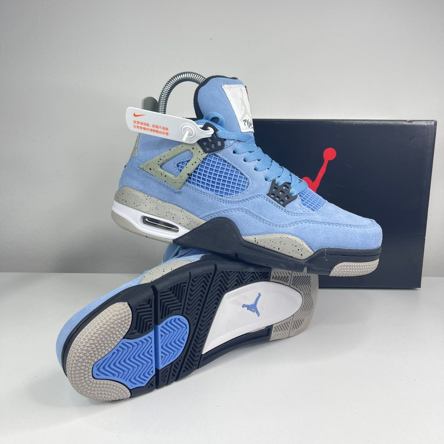 JORDAN 4 Retro University Blue